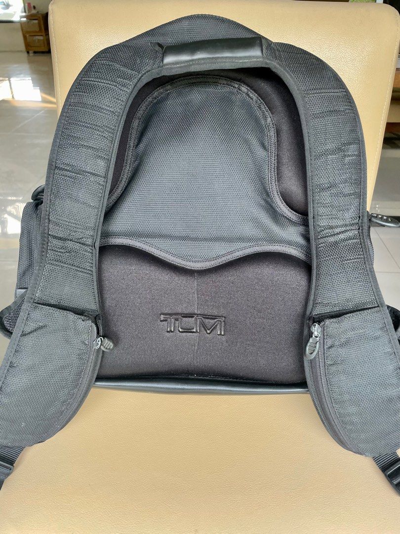 TUMI (520C) Nylon Laptop Backpack (Category: Backpacks) located in Cabuyao City. Submitted by biancatal29334 (Listing ID 1233287058, Image 2). Description: Pre-owned, highly durable & tough nylon material (17”H x17”W) -Overall condition is very good except for some peeling in the metal zipper pull tab (barely noticeable), covered by zip fabric on top) -Storebought in the US - Very spacious inside (see picture, 15” laptop & 11”Mac Air can fit toge