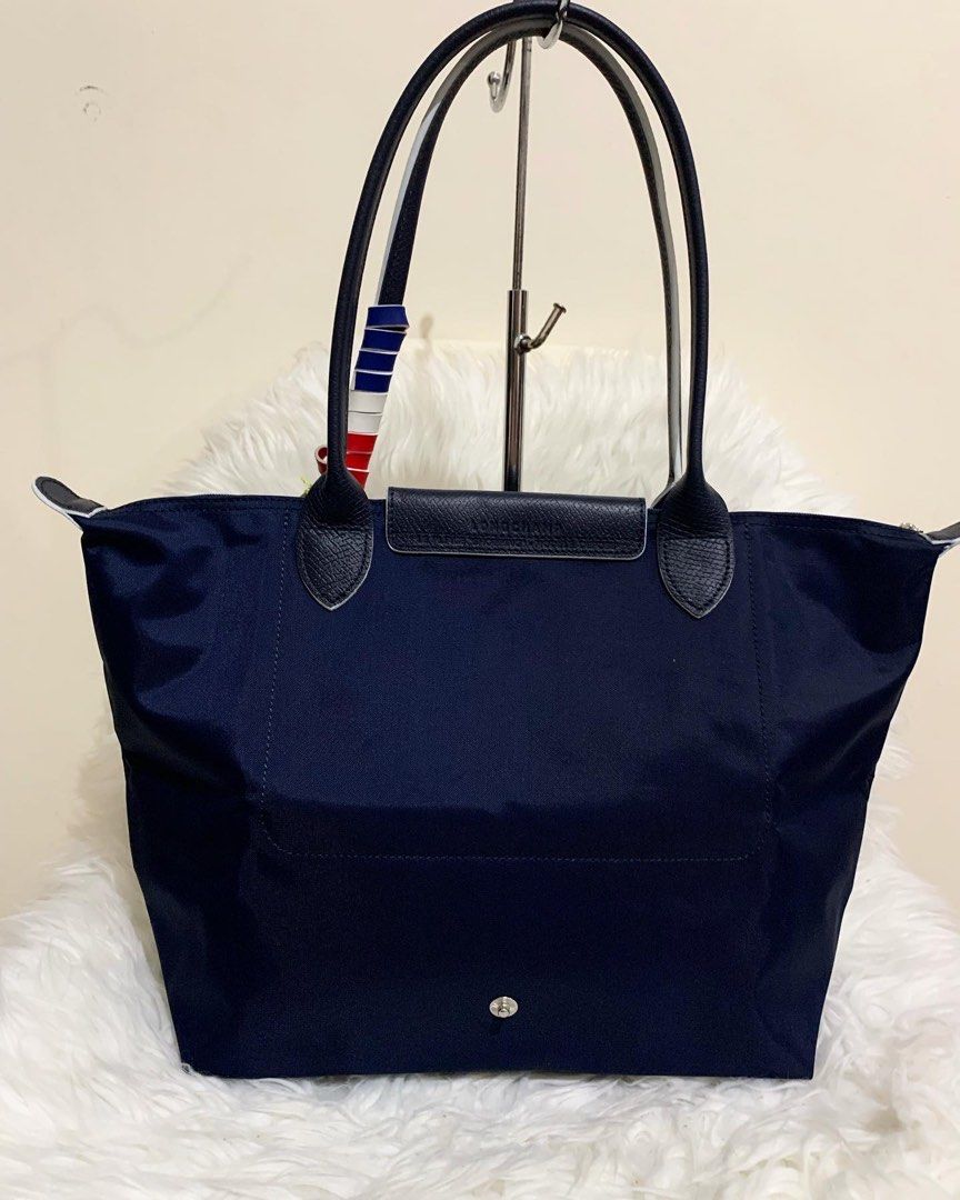💯 authentic longchamp small long handle (Category: Luxury Bags & Wallets) located in Cabuyao City. Submitted by luxbymishy (Listing ID 1233434942, Image 3). Description: 💯 authentic brand new condition .