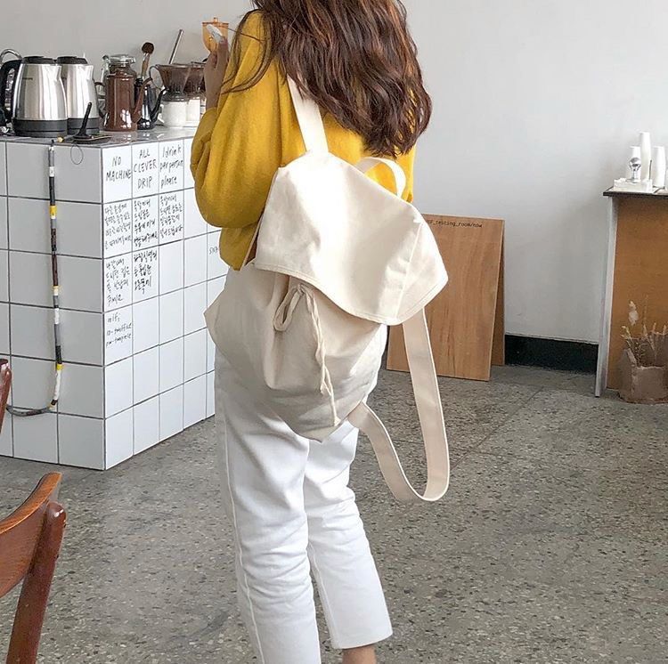 Beige canvas backpack hotsell