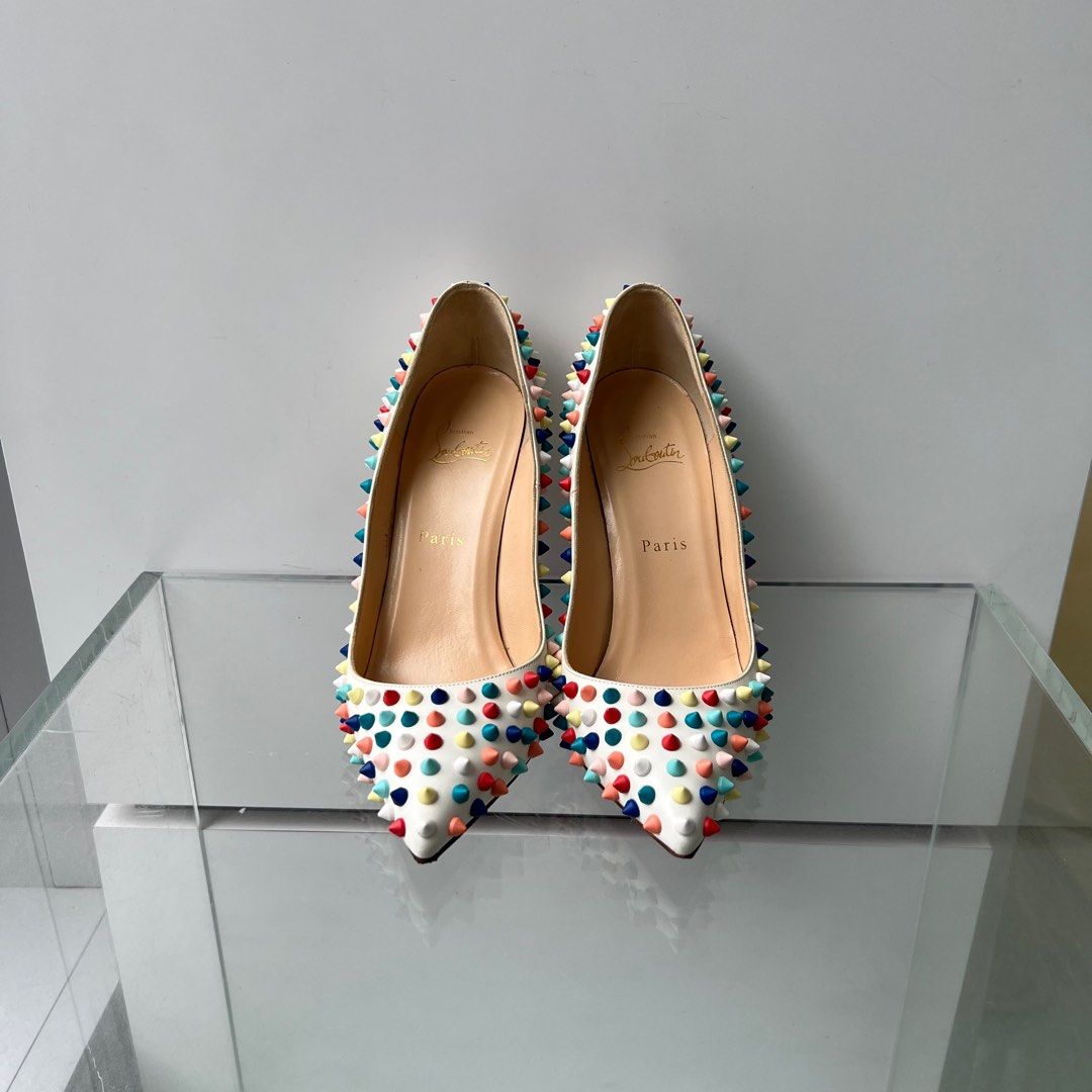 Louboutin white spiked heels top