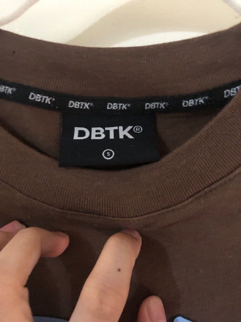 DBTK Cerberus Tee Brown (Category: Tshirts & Polo Shirts ) located in Manila. Submitted by polyvex (Listing ID 1233553080, Image 3). Description: DBTK Cerberus Tee Color: Brown Size: Small Dimensions: 28” Length (Body) 18” Width (Chest) Issue: small holes in upper left area due to laundry .