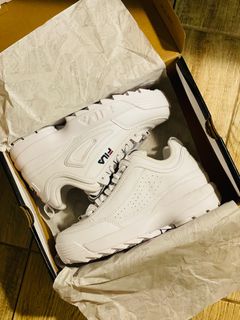 White shiny fila trainers on sale