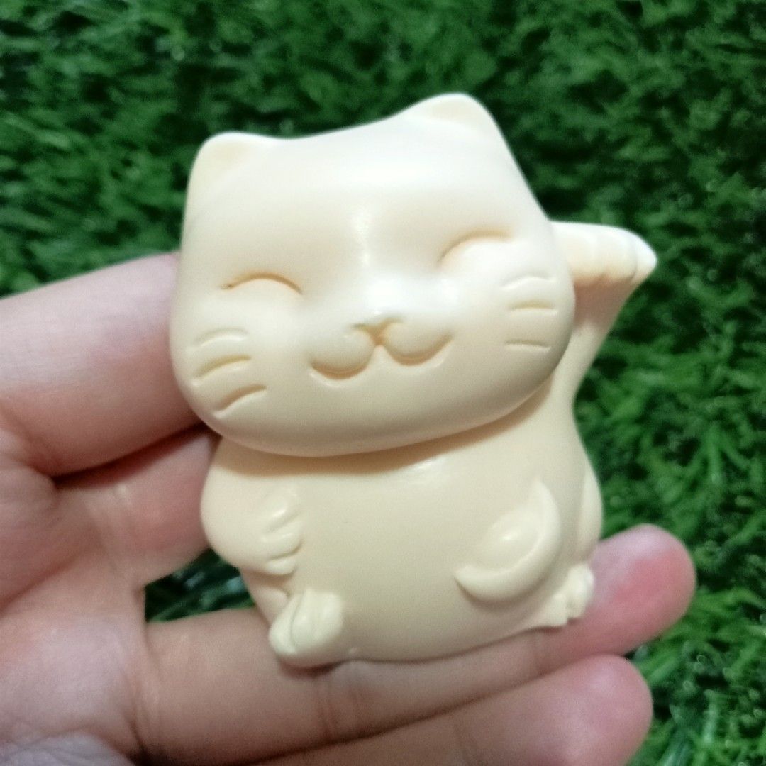 Lucky Cat in Ivory Fruit Carving on Carousell