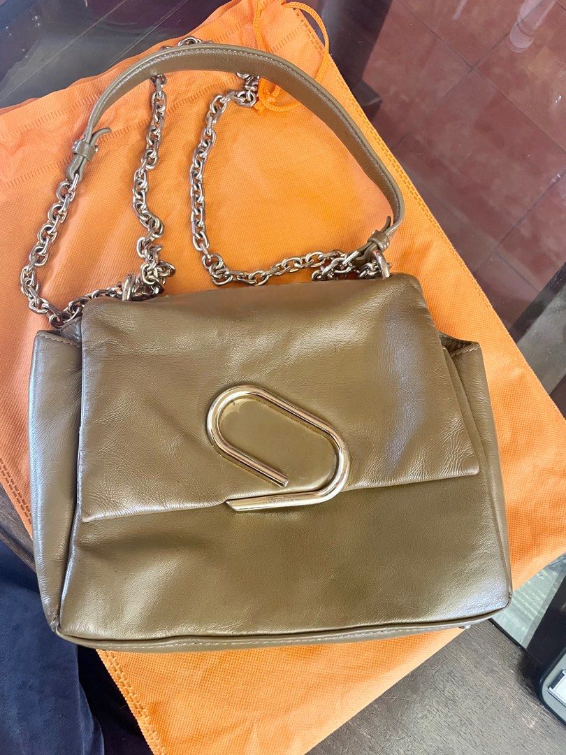 Philip Lim 3.1 Shoulder Bag (Category: Luxury Bags & Wallets) located in Muntinlupa City. Submitted by phbudgetluxuryfinds (Listing ID 1233424913, Image 1). Description: ****You are buying an Authentic bag**** Lambskin material Authentic With signs of use Two way bag - shoulder or cross body.