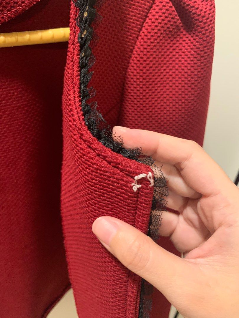Red Jacket (Category: Coats, Jackets and Outerwear) located in Kuala Lumpur. Submitted by doremonyx (Listing ID 1233443511, Image 3). Description: Minor (very small) defect on the front section there is a one sided hook missing .