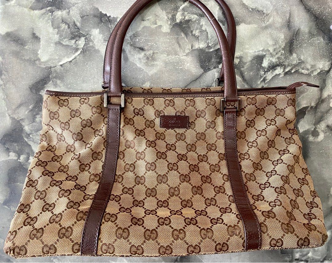 Heritage Vintage: Gucci Classic Monogram Canvas Pochette Bag. , Lot  #75015