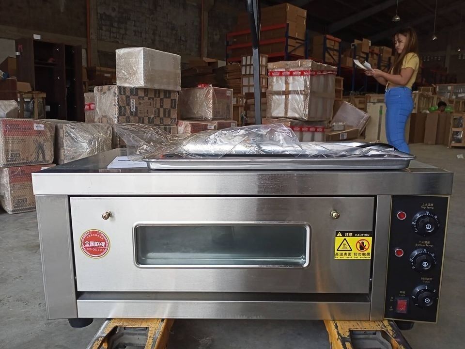 EP-31 HEAVY DUTY SINGLE DECK OVEN with tray (Category: Ovens & Toasters) located in Makati City. Submitted by commercialappliances (Listing ID 1233592878, Image 1). Description: Capacity (L) 56 Built-in Oven Features: Easy Cleaning Non-Sticky, Timer Wall Oven Type: Electric Power Consumption (W) 3200 Voltage:220 Power:3.2kw * Inside Dimensions: -Width 44.9cm -Length 61.5cm -Height 15.5 cm. PLEASE MESSAGE ME DIRECTLY FOR MORE INFORMATION!! LEGIT L