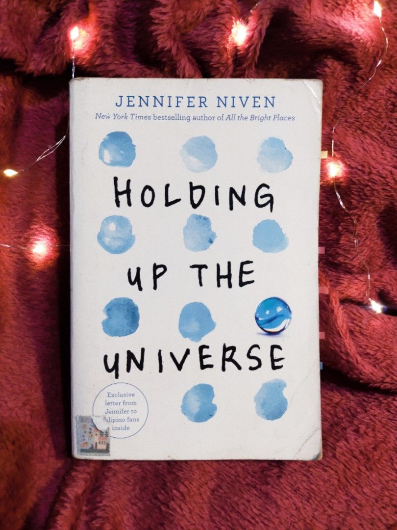 Holding Up the Universe (Category: Storybooks) located in Taytay. Submitted by itscolsie (Listing ID 1233695835, Image 1). Description: SHOPEE CHECKOUT JNT Payment: GCash Original Price: 485.00 Condition 8/10 RFS: Decluttering message me for more details.