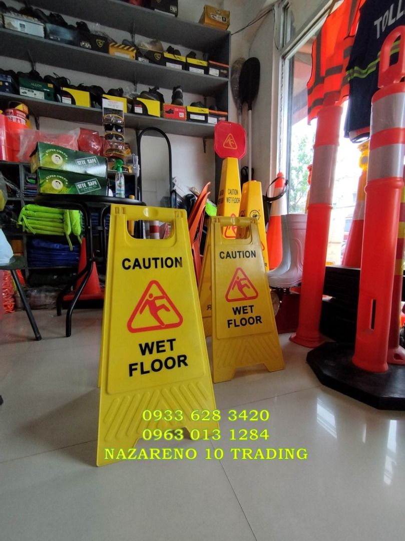 Industrial Caution Wet Floor Sign to warn people of potential slip and ...