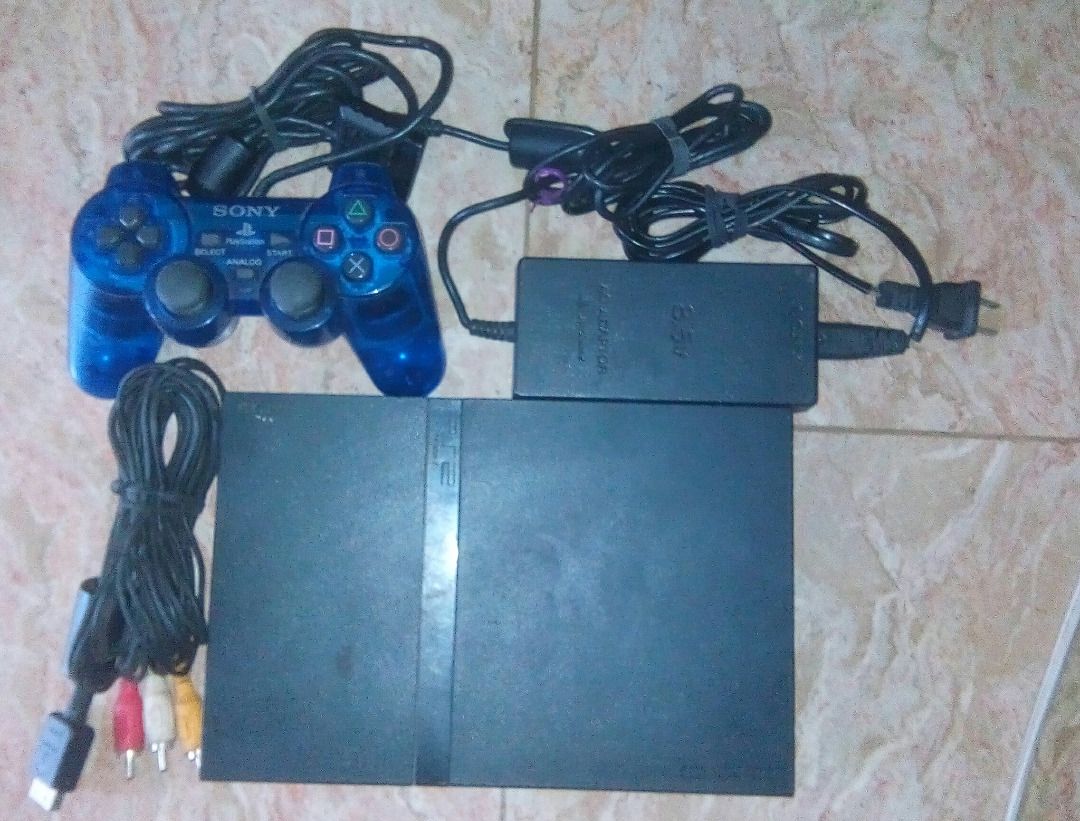 Sony PlayStation 2 (Category: PlayStation) located in Paranaque City. Submitted by rociarra2019-99005 (Listing ID 1233587910, Image 1). Description: PICKUP ONLY PS2 slim SCPH-75001 ***price negotiable*** AC 100 volts to 240 volts/DC 8.5 volts/5.3amps includes 2 controls/1 av cable/1 power cable/ 1 console you arrange for courier **send text**.