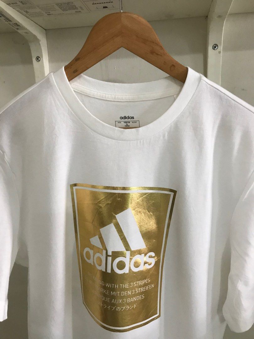 Adidas white and hotsell gold t shirt