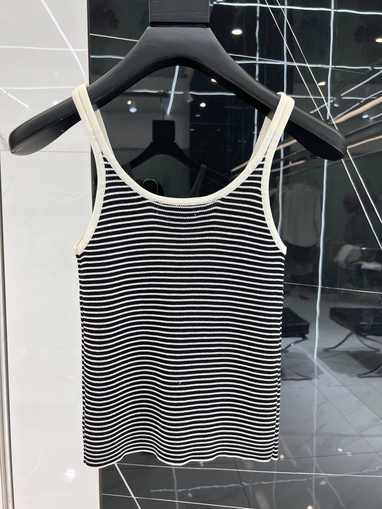 Womens Knits Sleeveless Vest Celine Letter T Shirts Woman Stripe Summer  Beach Tanks Tees Black White Embroidered Logo Short Shirt Lady Sexy Vests  Knitted Tops From Qinminjie503, $19.64