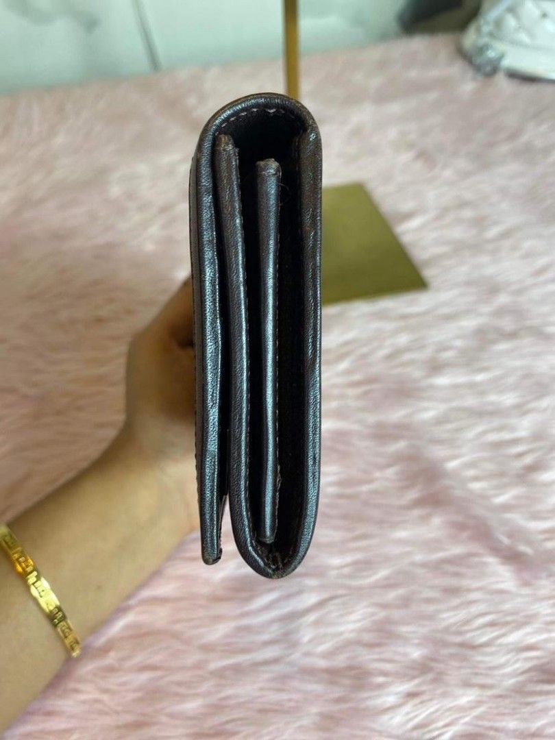 Authentic Fendi Long Wallet in Zucca (Category: Luxury Bags & Wallets) located in Manila. Submitted by bb_marykate (Listing ID 1233750496, Image 2). Description: hairline scratches on hardware (4th pic). no inclusions..