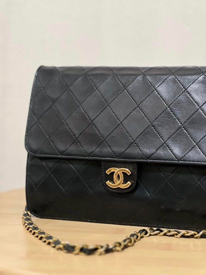 Chanel vintage shoulder bag clutch (Category: Luxury Bags & Wallets) located in Paranaque City. Submitted by jentree (Listing ID 1233839953, Image 2). Description: CC Vintage Clutch / Shoulder Bag Authentic 105k - with dust bag - with entrupy certificate - 24K plated hardware quilted lambskin - snap closure - burgundy interior Rank AB+ Thank you😊.