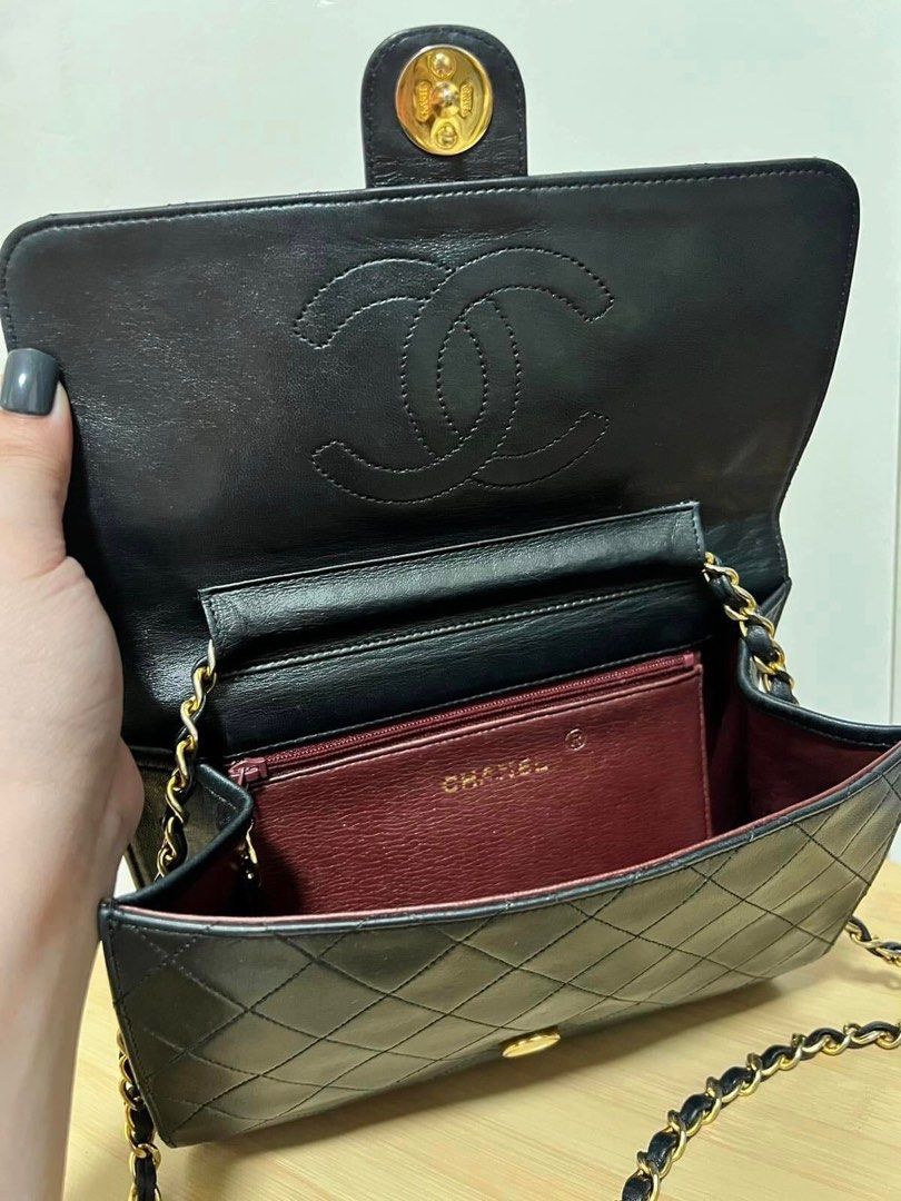 Chanel vintage shoulder bag clutch (Category: Luxury Bags & Wallets) located in Paranaque City. Submitted by jentree (Listing ID 1233839953, Image 3). Description: CC Vintage Clutch / Shoulder Bag Authentic 105k - with dust bag - with entrupy certificate - 24K plated hardware quilted lambskin - snap closure - burgundy interior Rank AB+ Thank you😊.