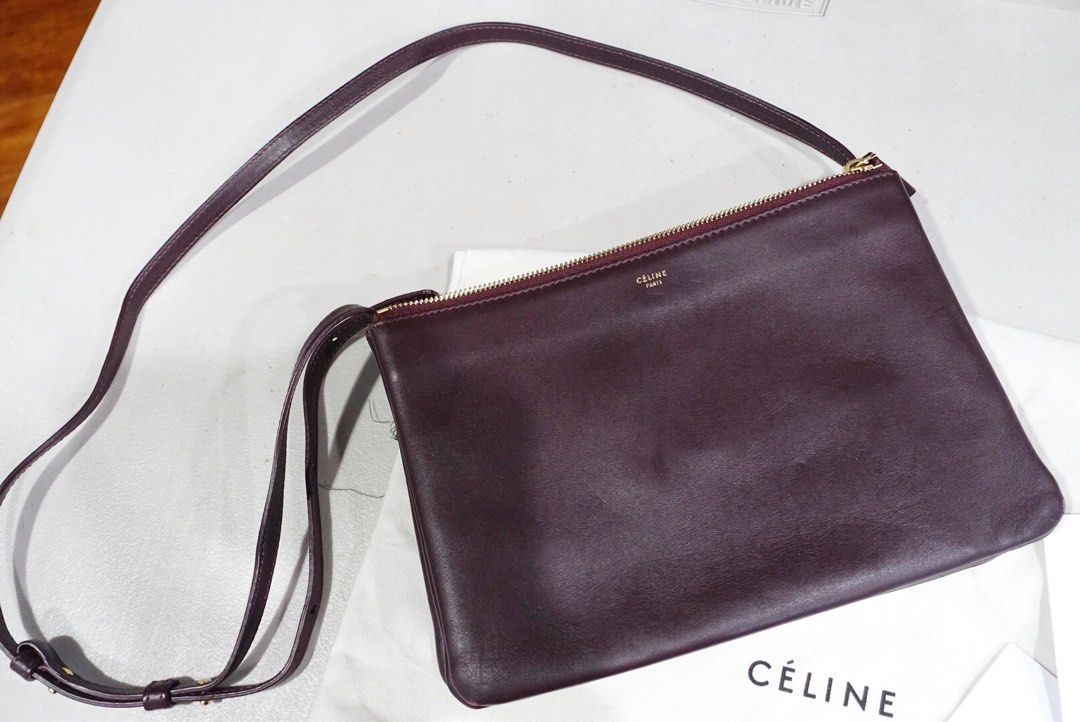 Céline Burgundy Large Trio Bag (Category: Luxury Bags & Wallets) located in Quezon City. Submitted by deniseangreyes (Listing ID 1233772017, Image 1). Description: Cèline Trio Large Description: Burgundy color in smooth lambskin. 100% Lambskin 100% Jersey lining. Size: 10 x 7 x 2 inches Adjustable leather strap with 20 inches drop. Zipped enclosure. Selling for 38,000 Preloved and in very good condition. Bought in Paris. Inclusions: Original dust