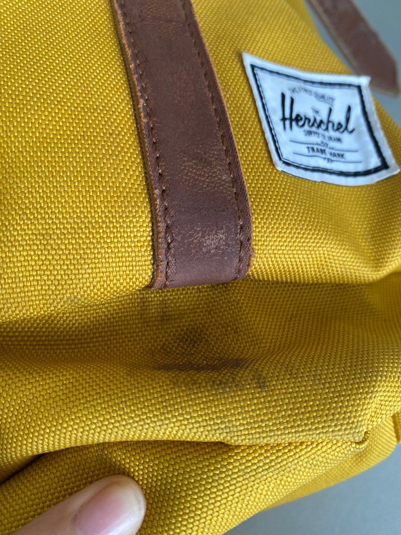 Herschel Yellow Backpack (peeled off and minor stain) on Carousell