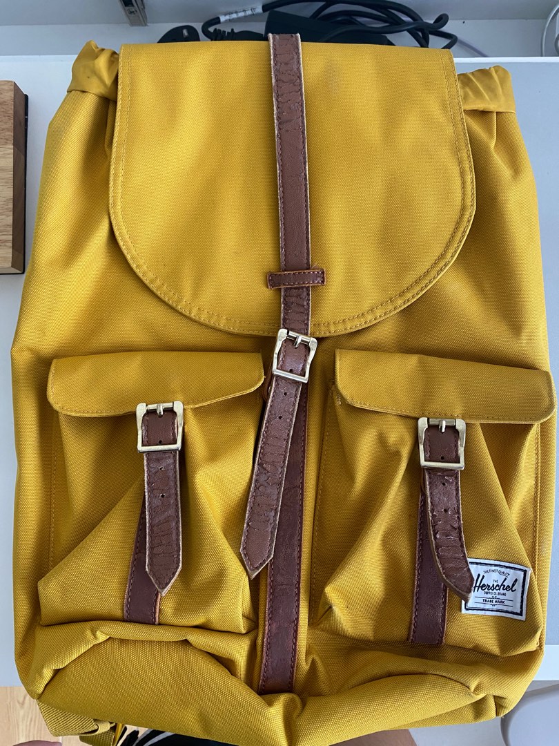 Herschel Yellow Backpack (peeled off and minor stain) on Carousell