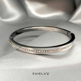 Kate Spade ♠ Ring It Up Bangle in Silver Tone