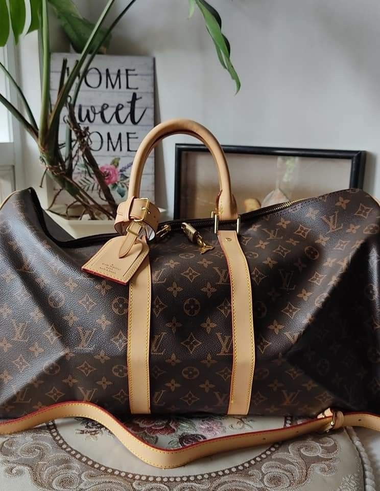 louis vuitton bandouliere keepall 55 w lv lock / key luggage tag and black  strap