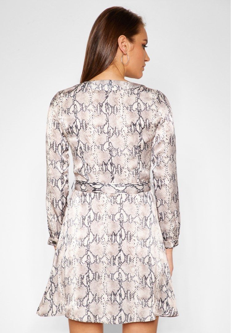 MANGO Snake Print Shirt Dress (Category: Dresses) located in Makati City. Submitted by ronsy21 (Listing ID 1233802648, Image 3). Description: Bought in Dubai. Only wore twice. This is best paired with ankle/Chelsea boots. RFS: Doesn’t fit anymore..