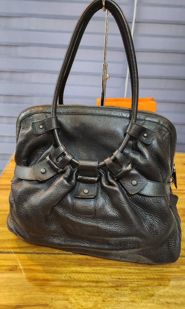 Salvatore Ferragamo Leather Handbag (Category: Luxury Bags & Wallets) located in Daet. Submitted by BagMom (Listing ID 1233793459, Image 1). Description: Salvatore Ferragamo Leather Handbag Good Condition With card and dust bag Swipe for detailed pics 👉cash or installment 👉PM or viber (09189599588) for details Disclaimer: BagMom is not associated with the brand featured.All copyrights reserved to the original brand holders..