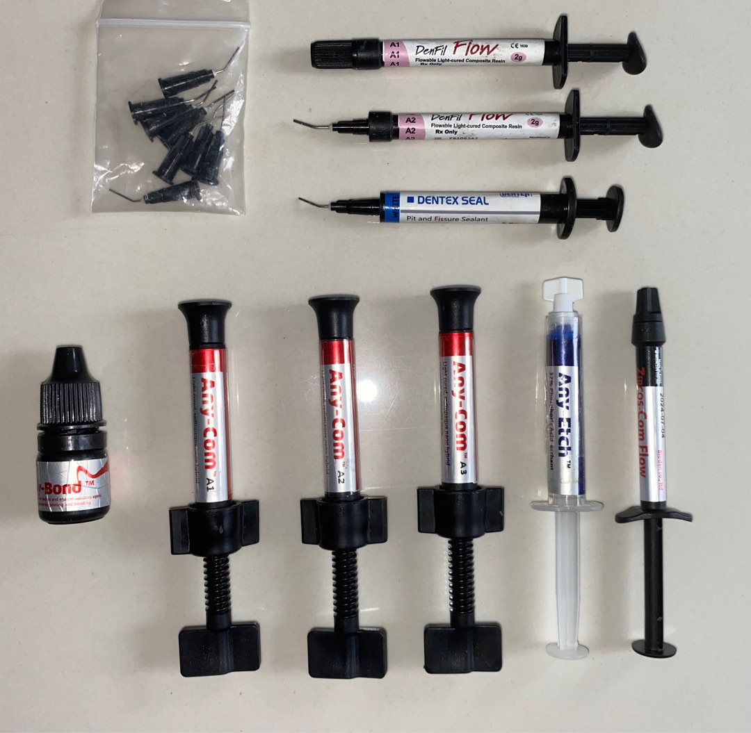 Set of Dental Composite Material + Acid Etchant + Bonding Agents