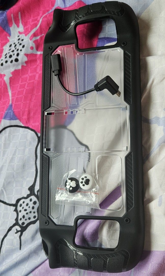 Steamdeck case (Category: Game Gift Cards & Accounts) located in Singapore. Submitted by ehazard (Listing ID 1233765850, Image 3). Description: pls note that the case should come with a stand but factory fault didnt include the stand therefore letting go cheap n comes with cable and joystick cover. hence if u jus need a case to protect your deck u can consider..