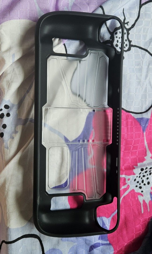 Steamdeck case (Category: Game Gift Cards & Accounts) located in Singapore. Submitted by ehazard (Listing ID 1233765850, Image 1). Description: pls note that the case should come with a stand but factory fault didnt include the stand therefore letting go cheap n comes with cable and joystick cover. hence if u jus need a case to protect your deck u can consider..