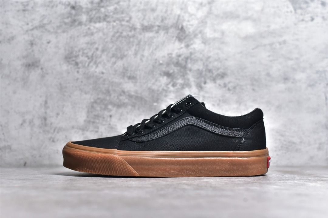 Black leather vans black soles top