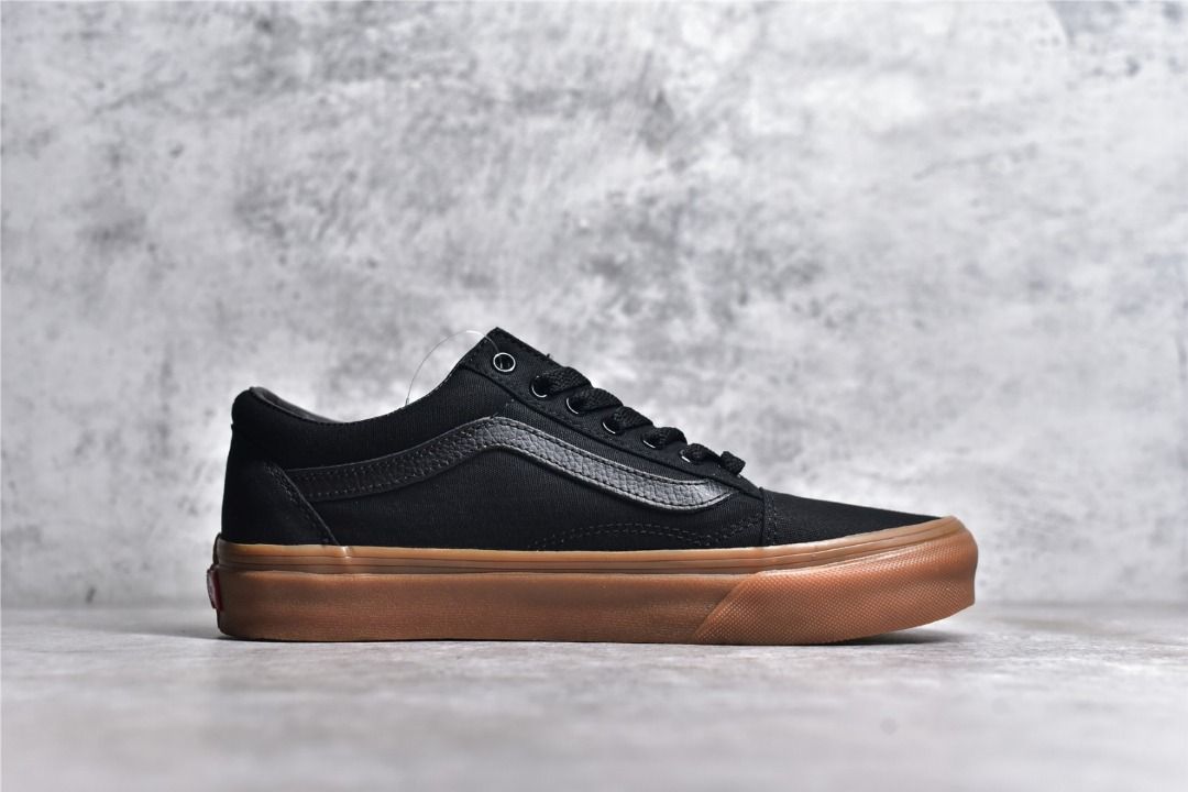 All black old sale skool vans gum sole
