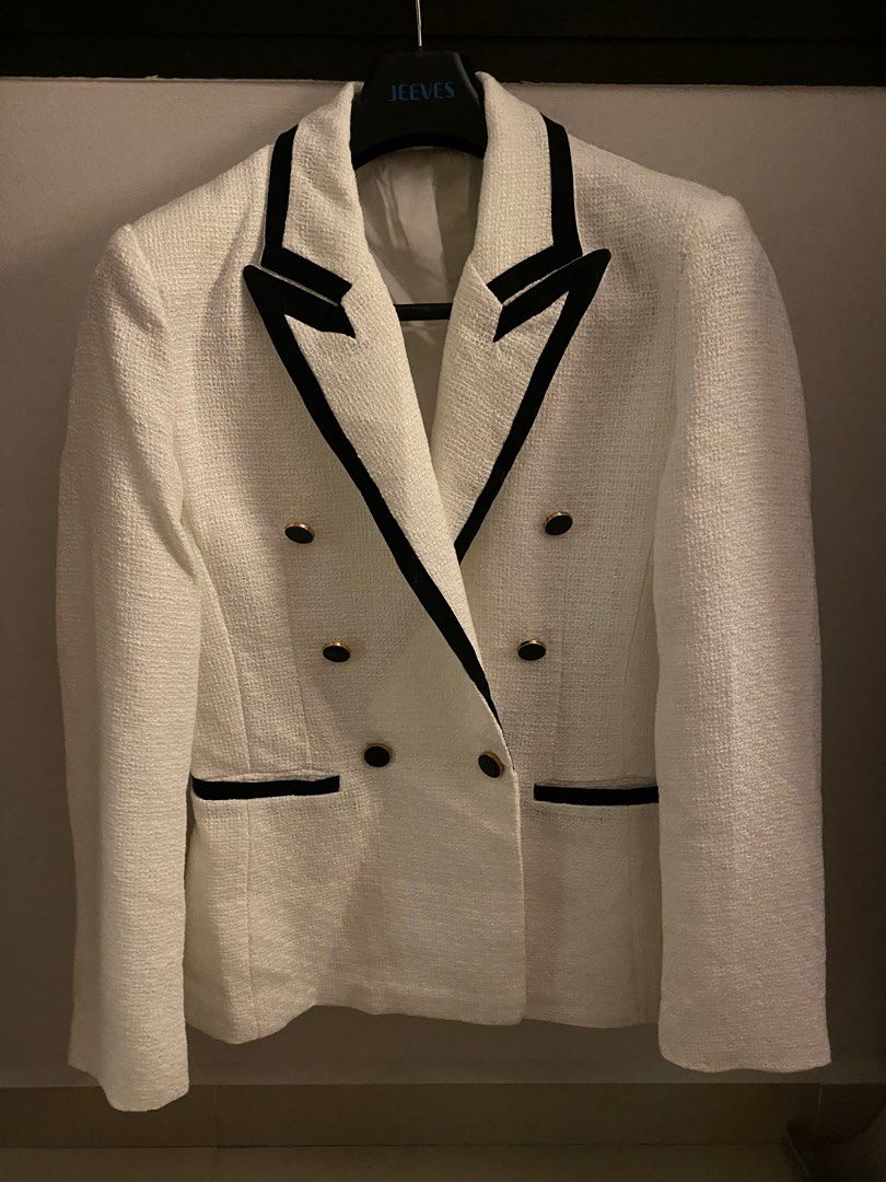 White blazer with black accents