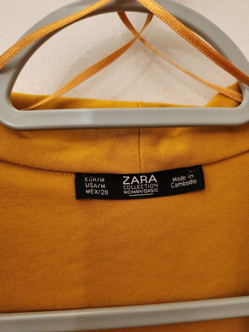 Zara Overlap Dress with Shoulder Pads (Category: Dresses) located in Pasig City. Submitted by pepperoo (Listing ID 1233802229, Image 3). Description: Bought in Spain Color: Mustard Size: M Overlap Dress with Shoulder Pads.