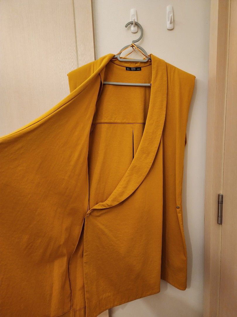 Zara Overlap Dress with Shoulder Pads (Category: Dresses) located in Pasig City. Submitted by pepperoo (Listing ID 1233802229, Image 2). Description: Bought in Spain Color: Mustard Size: M Overlap Dress with Shoulder Pads.
