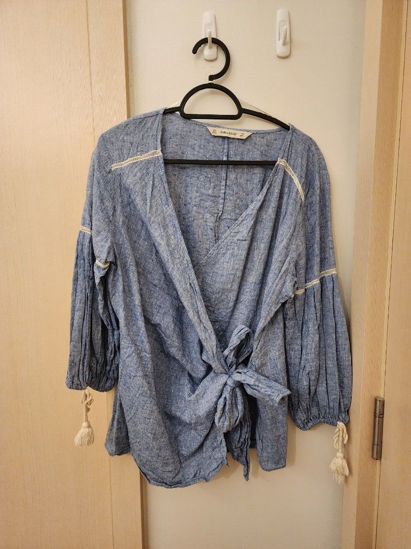 Zara Overlap Longsleeves Blouse with Tassels (Category: Blouses) located in Pasig City. Submitted by pepperoo (Listing ID 1233803420, Image 1). Description: Zara Overlap Longsleeves Blouse with Tassels Brand New Bought in Spain Color: Blue Size: L.
