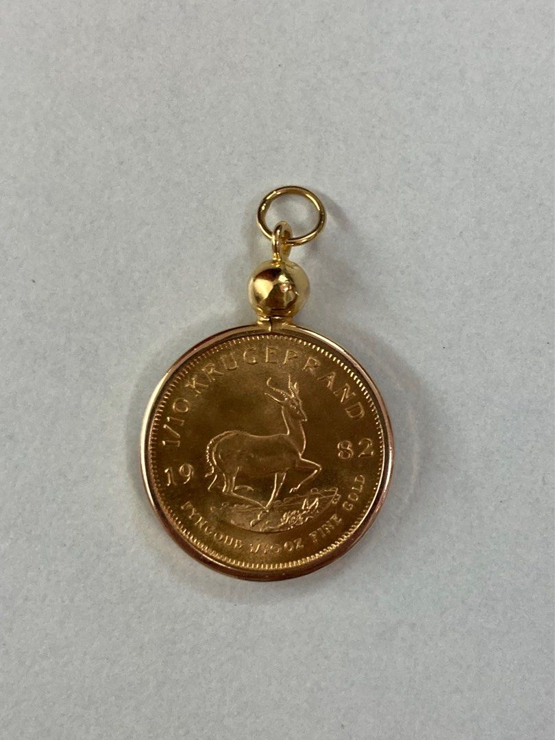 1982年富格林1/10安士金幣！重量9分1厘！＇成色91.6黃金（即22 K金）！加上14 K金框可作吊咀佩戴！收藏40年！, 名牌, 飾物及配件-  Carousell