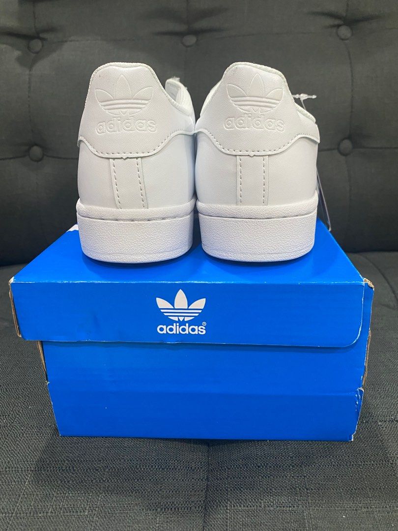 triple white adidas shoes