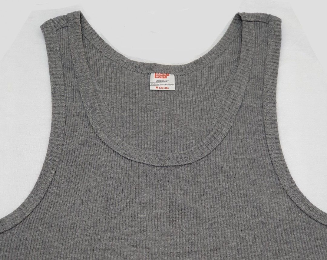 Bench Body Undershirt (Gray) (Category: Underwear) located in Paranaque City. Submitted by fcdm_olsell (Listing ID 1233986311, Image 3). Description: - Brand: Bench Body - 100% Authentic - Size: M on tag - Width (Body): 16.5 inches * Good for up to 32 inches waistline - Length (Shoulder to Bottom): 24.5 inches * Good for up to 5'8" tall - Material: 60% Combed Cotton, 40% Polyester - Color: Gray (See photos) - Condition: Like New (No issues) - Was