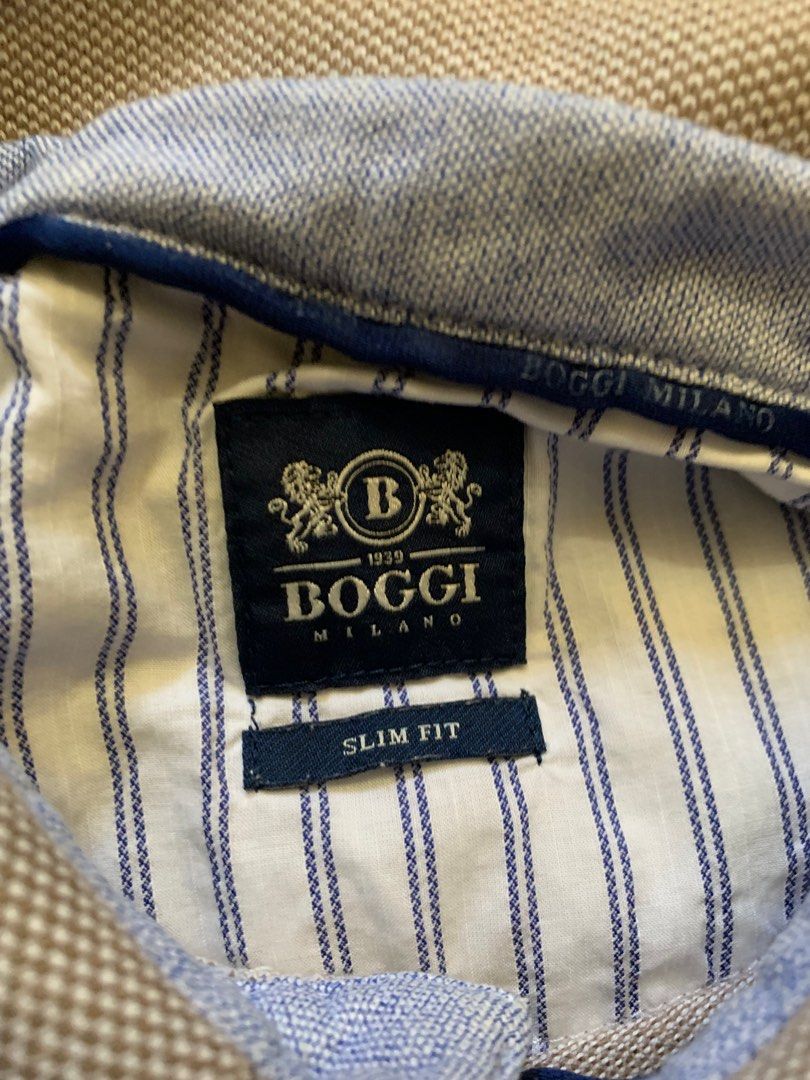 BOGGI Milano Polo Shirt (Category: Tshirts & Polo Shirts ) located in Quezon City. Submitted by rgb1234 (Listing ID 1233976714, Image 3). Description: Brand: BOGGI MILANO Price: Php 599 🎨9.7/10 Quality: Good as new Size: Please see the pics for the dimes ‼️Color might slightly differ due to lighting ‼️We prioritize miners who can pay in advance ‼️No bugus buyers/joy resevers pls.
