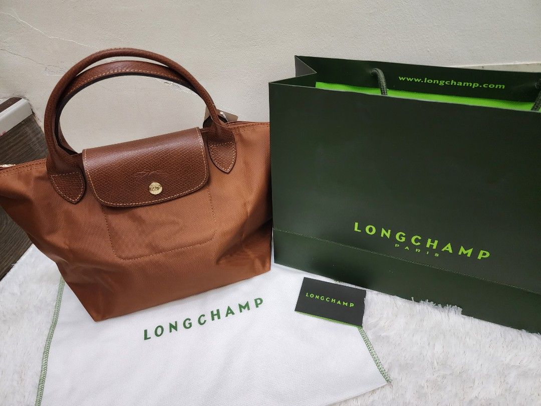 Longchamp Small Short Handle (Category: Luxury Bags & Wallets) located in Manila. Submitted by authenticoutletfindsph (Listing ID 1234024899, Image 3). Description: Authentic outlet bought in EU outlet. Can send the actual photo and price tag of each bag. Also available in other sizes..