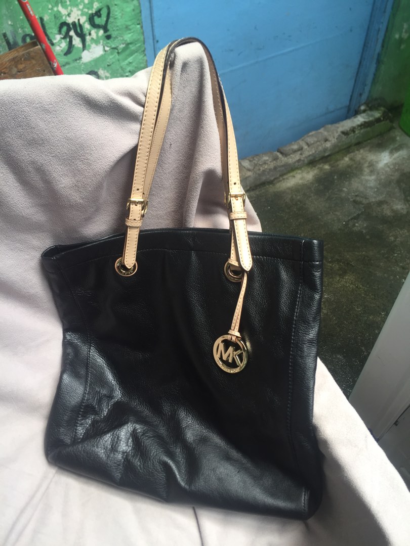 Michael Kore leather on Carousell