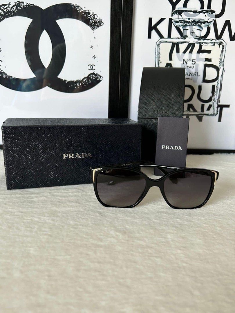 Prada Black Gold Sunglasses (Category: Sunglasses & Eyewear) located in Manila. Submitted by bagislifeshop (Listing ID 1233950082, Image 1). Description: ▪️Prada Black Gold Sunglasses▪️ ☑️Available in Pampanga ✅Condition: 8.8/10 ✅Lens material: Cr39 ✅Lens Technology: Gradient ✅Lens color: Polar Gray Gradient ✅LENS: 55MM, TEMPLE: 140MM & BRIDGE: 17MM ✅Inclusion: Case and box .