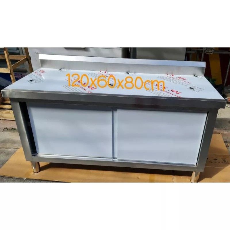Preparation table with cabinet stainless WITH BACKSPLASH (Category: Coffee & Tea Tableware) located in Manila. Submitted by vangabriel26 (Listing ID 1233896345, Image 1). Description: preparation table with cabinet stainless Steel sliding door size 120x60x80cm WITH BACKSPLASH.