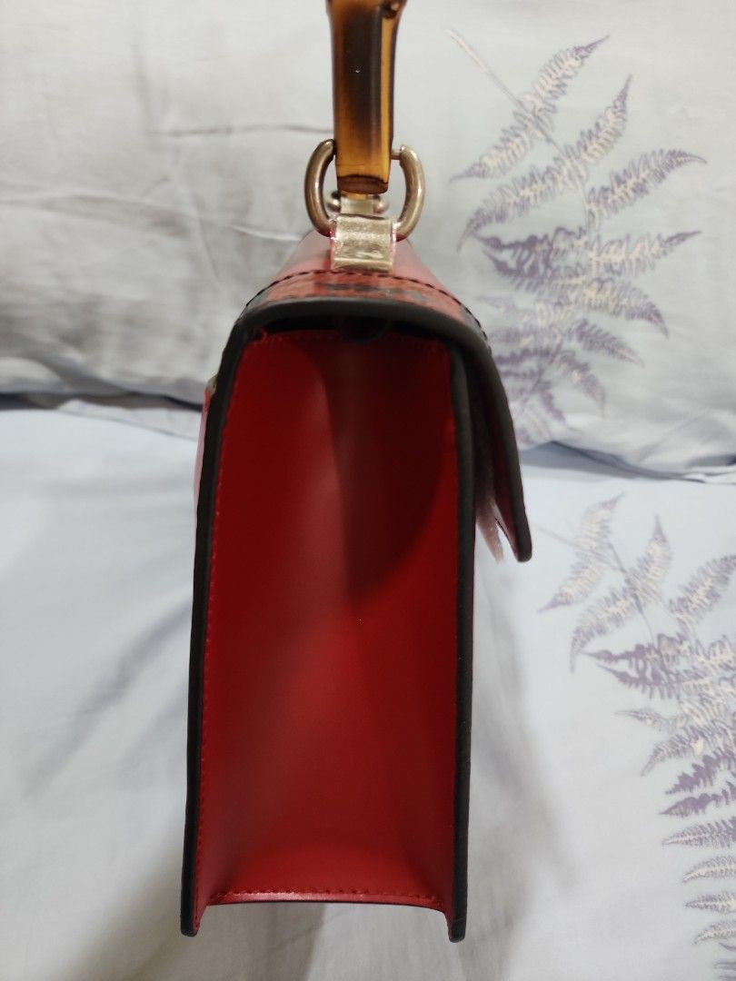 Red bamboo handle bag