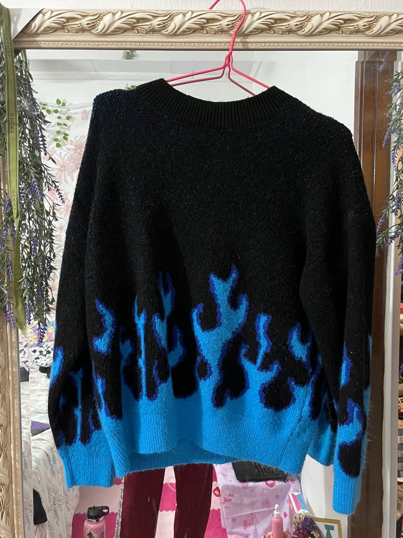 Blue top fire sweater