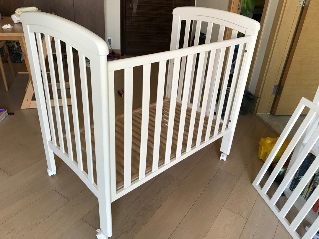 Troll nicole mini baby cot, Babies & Kids, Baby Nursery & Kids Furniture, Cots & Cribs on Carousell