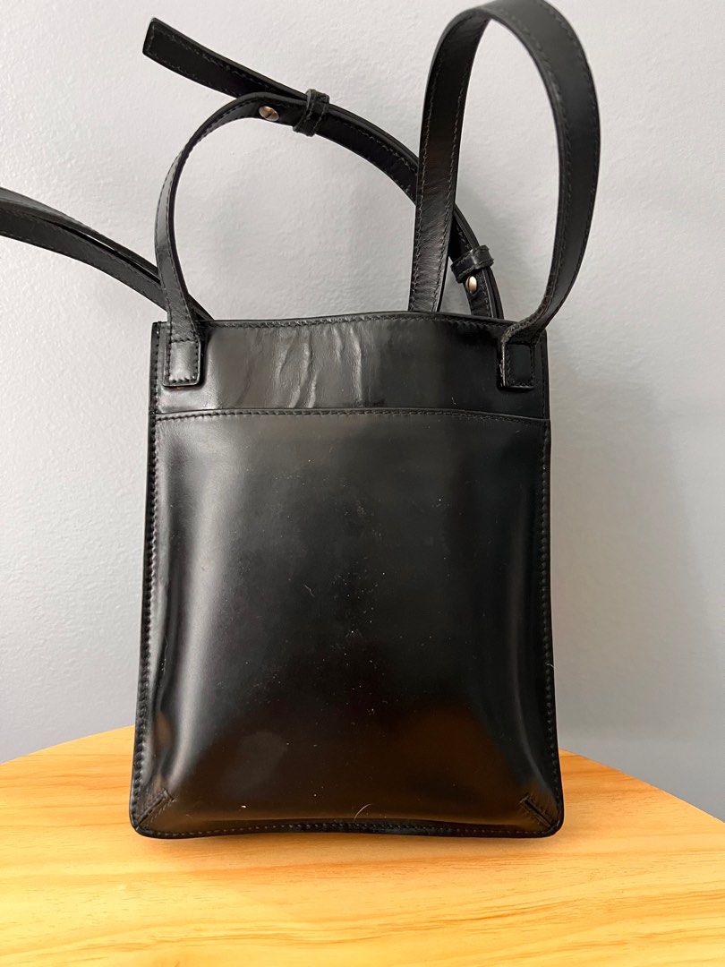 Authentic Cartier SMALL tote Bag (Category: Luxury Bags & Wallets) located in Cagayan de Oro. Submitted by riggstuffs (Listing ID 1234146765, Image 2). Description: Guaranteed Authentic Cartier Small Tote Sling bag Leather material Clean interior, no rubs or rips the corners Adjustable sling Disclaimer: Riggstuffs is not associated or affiliated with the brand posted. All copyright and trademark belong solely to the original brand owner..