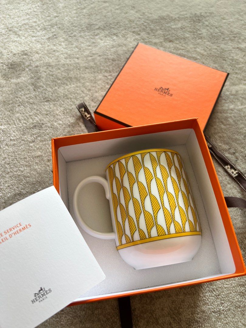 Authentic Hermes Mug (Category: Luxury Accessories) located in Manila. Submitted by lalizaaa (Listing ID 1234136816, Image 2). Description: 100% Authentic Hermes mug Brandnew Price is for 2 pcs With box and ribbon.