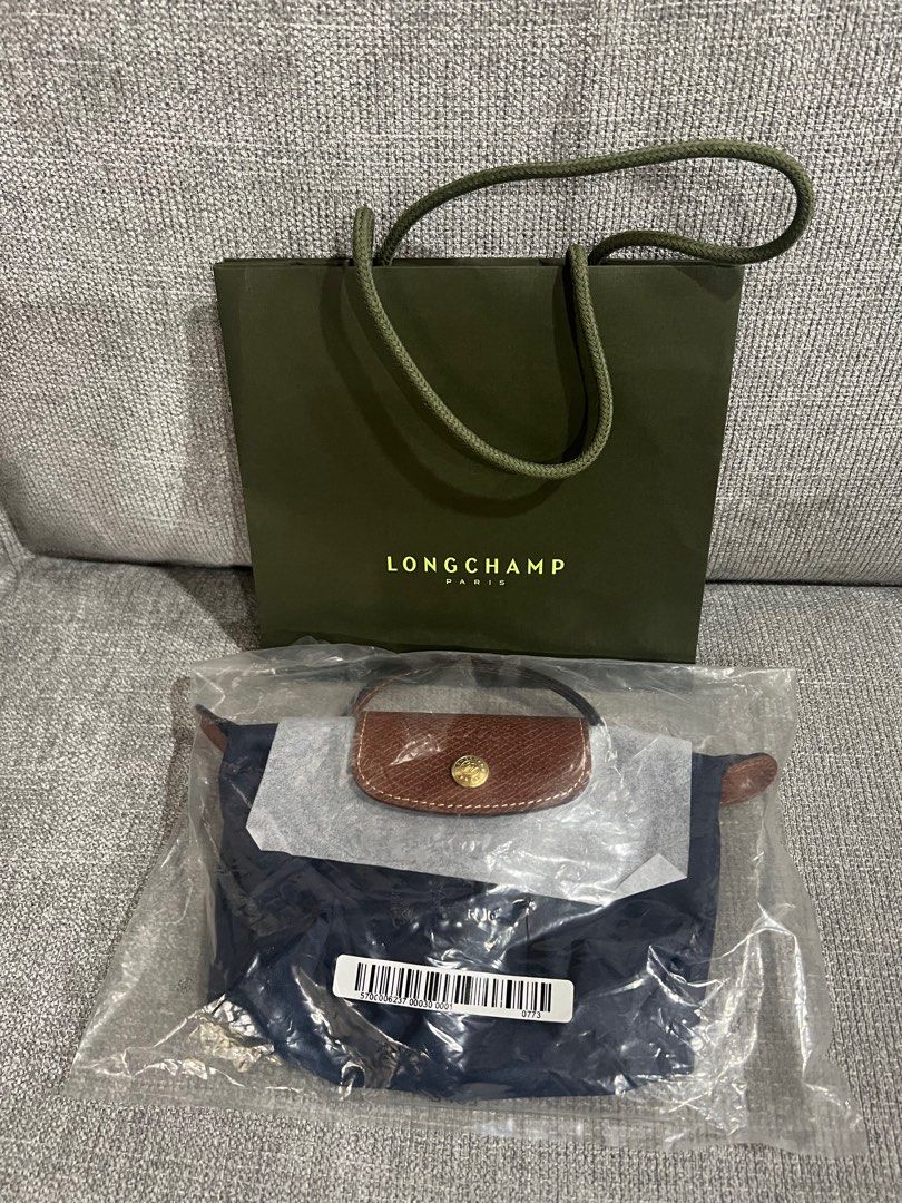 Longchamp Le Pliage Mini Monogram Printed Leather Tote Bag, Women's  Fashion, Bags & Wallets, Tote Bags on Carousell