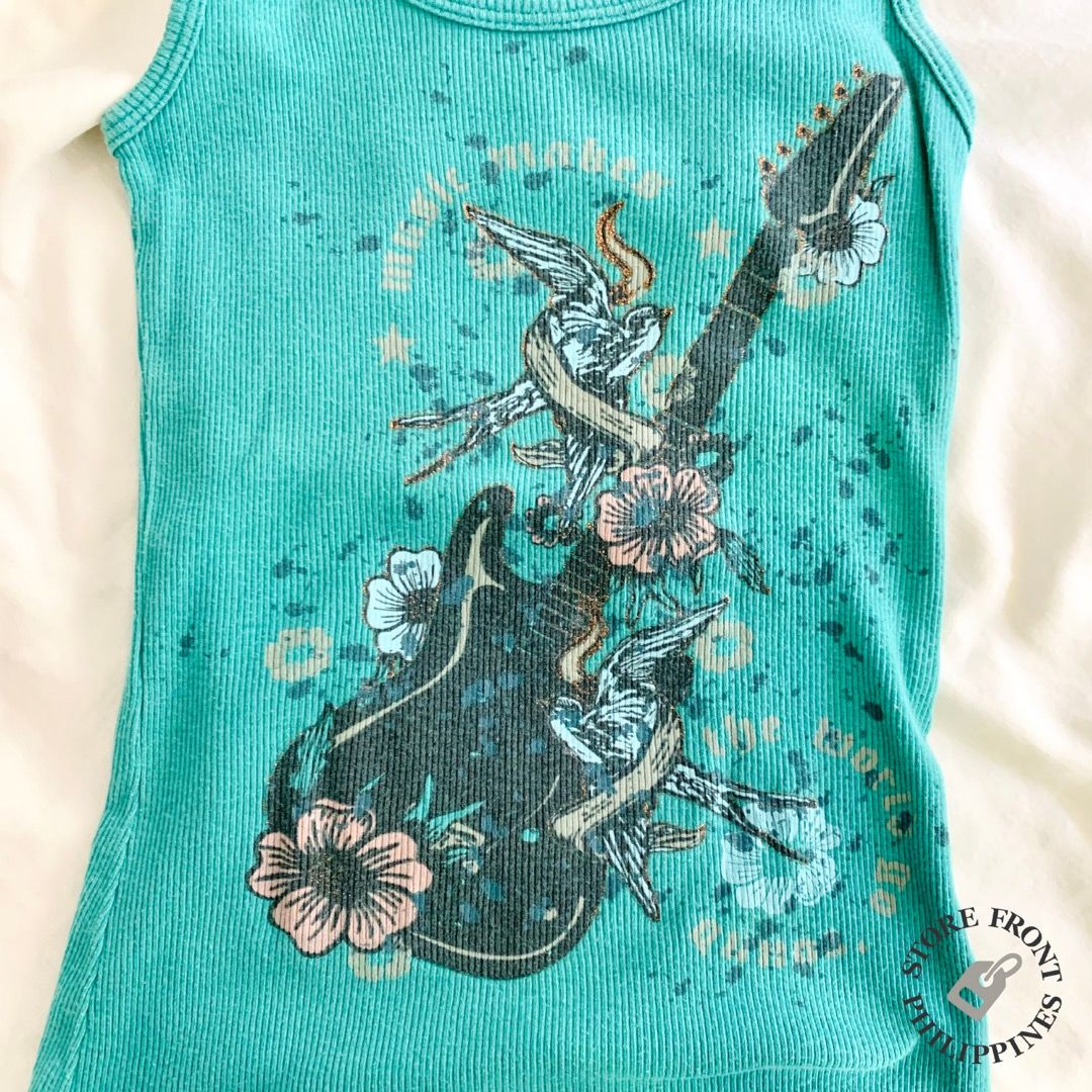 benzene-girl-tank-top-teal-on-carousell